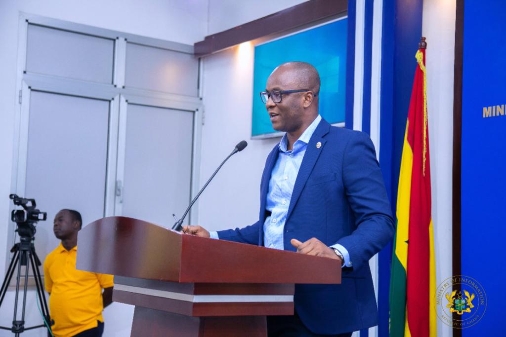 Edward Kweku Asomani (left), Deputy National Security Coordinator, interacting with Kojo Oppong Nkrumah, the Minister of Information, after the press briefing. Picture: ELVIS NII NOI DOWUONA