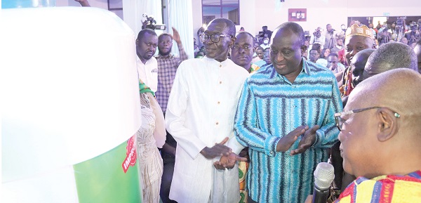 Professor Samuel Ato Duncan (left), Founder and Chief Executive Officer of COA Research; Alan Kyerematen (2nd from left), Minister of Trade and Industry, and Nana Mensa Bonsu (right), Asakyirihene, Benkum Division of the Kumasi Traditional Council, at the relaunch of COA Mixture yesterday. Picture: ELVIS NII NOI DOWUONA