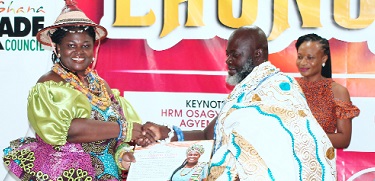 Nene Angmor Owuodjao II (right), President of the Ga-Dangme Traditional Council, presenting a citation to Catherine Cudjoe, President of the National Ghana Parade Council (NGPC) at the launch of the festival. Picture: Maxwell Ocloo
