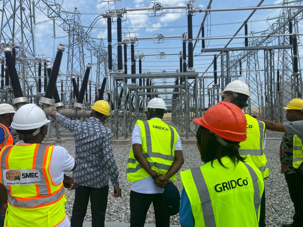 MCC Deputy Chief Executive Officer, Mahmoud Bah (center), receives a tour of the Pokuase Bulk Supply Point (BSP), which is one of the four power stations built as part of the $316 million MCC-Ghana Power Compact. 