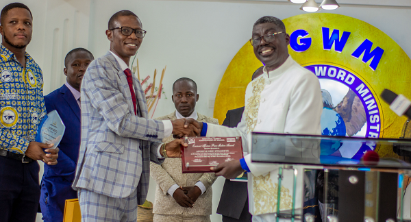 The Director of Postgraduate Studies & Research of the Pentecost University College, Apostle Dr. Christian Tsekpoe, picking an award on behalf of the Chairman of the Church of Pentecost, Apostle Dr Eric Nyamekye The Director of Postgraduate Studies & Research of the Pentecost University College, Apostle Dr. Christian Tsekpoe, picking an award on behalf of the Chairman of the Church of Pentecost, Apostle Dr Eric Nyamekye