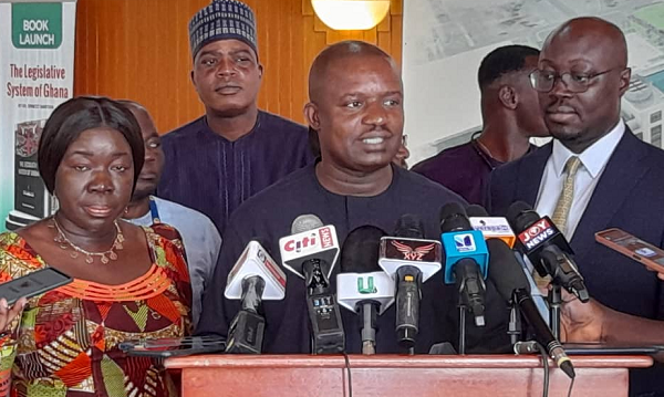 John Abu Jinapor addressing the press conference 