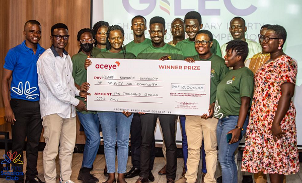 Students of KNUST in a group photograph holding a dummy cheque for GH¢  10,000 after emerging winners of the GILEC competition