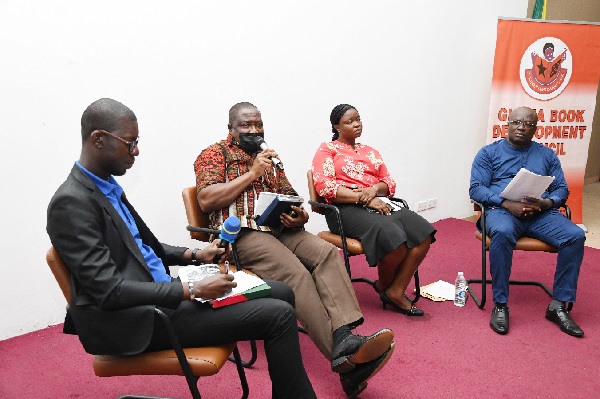 Samson Osenda (2nd from left), Head of Schools and Colleges Library at the Ghana Library Authority, delivering his remarks at the event to mark World Book and Copyright Day. With him are Kofi Asante Twumasi (left) of the Ghana Book Development Council, Sheila Narki Djangmah (2nd from right), Copyright office, and Asare Konadu Yamoah, President of the Ghana Publishers Association. Picture: EBOW HANSON