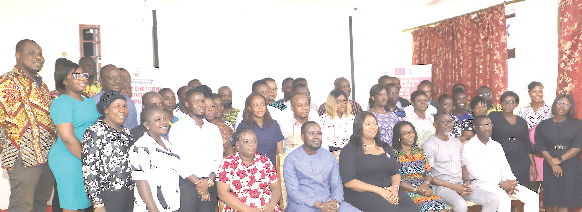 Sena Owusu-Gibson (seated 3rd from right), the Deputy Director of Human Trafficking Secretariat of the Ministry of Gender Children and Social Protection, with other participants after the workshop. Picture: GABRIEL AHIABOR