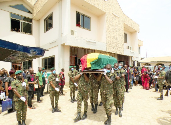 Officers of the Ghana Immigration Service carrying the remains of the late Michael Ekow Otoo, Immigration Control Officer of the Ghana Immigration Service, to be laid to rest. Picture: ELVIS NII NOI DOWUONA