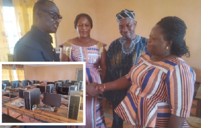 Dr Louis Nagali Koray(left) handing over the computers (INSET) to Catherine Assibi Nyaaba (right), Headmistress of the primary school.  Looking on are Millicent Atafo and Nuhu Yussif, heads of Kindergarten and Junior High School