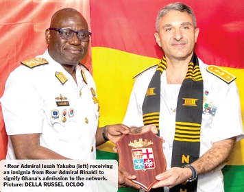 Rear Admiral Issah Yakubu (left) receiving an insignia from Rear Admiral Rinaldi to signify Ghana's admission to the network. Picture: DELLA RUSSEL OCLOO