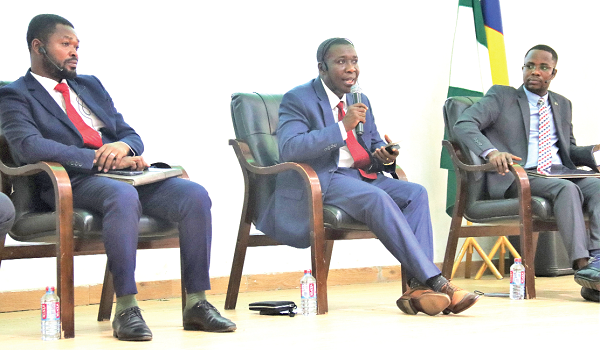 Prof. William Baah-Boateng (middle), Head, Department of Economics, University of Ghana, addressing the forum. Picture: ELVIS NII NOI DOWUONA