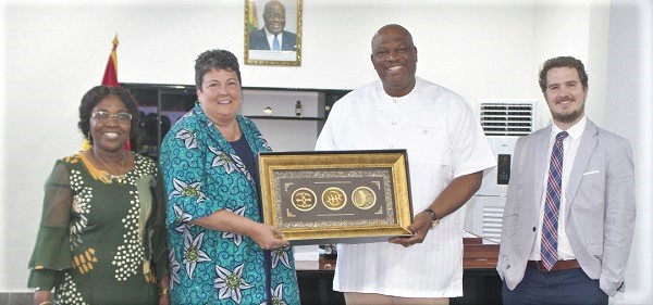 Henry Quartey (2nd from right), Greater Accra Regional Minister, presenting a gift to Virginia E. Palmer, the US Ambassador to Ghana. With them are Felicia Dapaah (left), Chief Director of the Greater Accra Regional Coordinating Council, and Chris Pery (right), Political Officer at the US Embassy . Picture: ESTHER ADJORKOR ADJEI