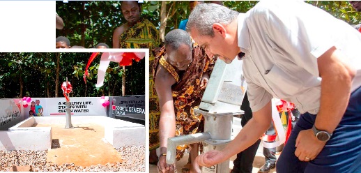 Nana Ofori Adesi, the Kontihene of Kona, and Hakim Ouzzani, the Managing Director of Societe General Bank, ready to take a sip of the water. INSET: The facility at Kona