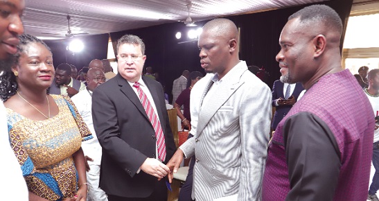 Mustapha Ussif (2nd from right), Minister of Youth and Sports, in a handshake with Pierre Laporte (2nd from right), World Bank Country Director for Ghana, after the launch of the programme. With them are Dr John Kumah (right), a Deputy Minister of Finance, and Kosi Yankey-Ayeh (left), Chief Executive Officer, GEA. Picture: SAMUEL TEI ADANO