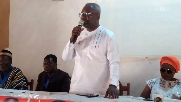Kofi Akpaloo (standing) speaking at the conference to endorse party executives in the Upper East Region