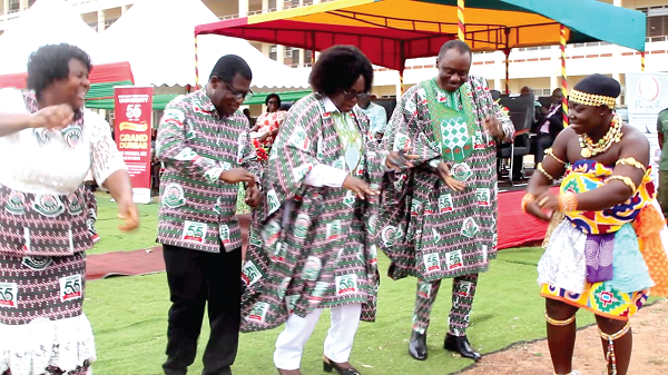Justina Owusu-Banahene (middle), Bono Regional Minister; Prof. Kwadwo Adinkrah-Appiah (2nd from left), Vice-Chancellor of STU, and Samuel Obuor Ankamah, Registrar of STU, dancing during the occasion. With them are a member of a cultural troupe and an officer of the university