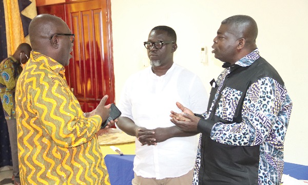Alex Frimpong (right), CEO, Ghana Employers Association, interacting with Dr Yaw Baah (left), Secretary-General, Trades Union Congress, and Kenneth Koomson (middle), Deputy Secretary General, Ghana Federation of Labour, at the forum. Picture: ELVIS NII NOI DOWUONA