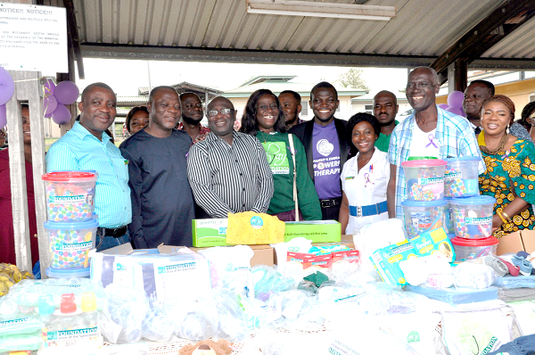 The Chief Executive of HTH, Dr John Tampuori (3rd left), and other officials of the hospital and Jay Foundation after the donation