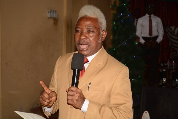 The General Overseer of the Evangelical Church of Ghana, Rev Maxwell K.K Liwangol, speaking during the 31st December Watch night service at Old Fadama.