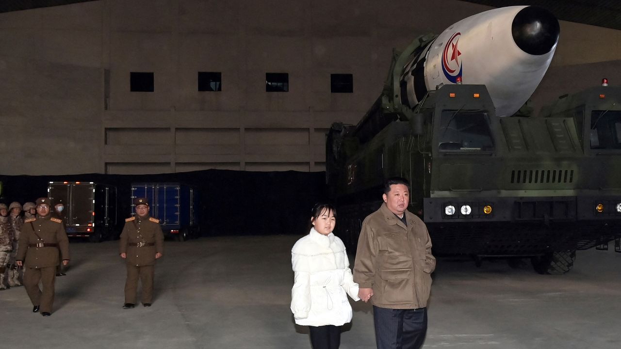 KCNA/Reuters - North Korean leader Kim Jong Un, along with his daughter, inspects an intercontinental ballistic missile (ICBM) in this undated photo released on November 19, 2022, by North Korea's Korean Central News Agency.