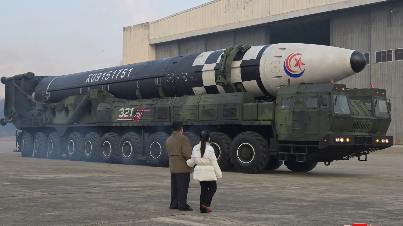 KCNA/Reuters - North Korean leader Kim Jong Un, along with his daughter, inspects an intercontinental ballistic missile (ICBM) in this undated photo released on November 19, 2022, by North Korea's Korean Central News Agency.