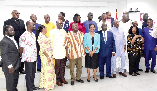 Dr. Kwaku Afriyie (middle), Minister of Environment, Science, Technology and Innovation, with the participants after the launch