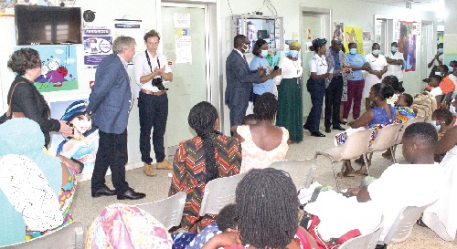 Dr Adeline Asante Kwabiah (5th right), Pediatrician, 37 Military Hospital, educating some diabetes patients, while  Tom Norring (left), the Danish Ambassador, looks on. Picture: ERNEST KODZI