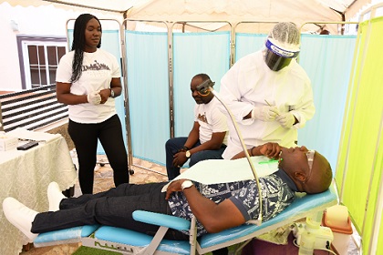 An official of JL Properties undergoing teeth polishing and scalling during the health screening exercise. Picture: EBOW HANSON