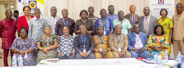  Officials of Electricity Company of Ghana with metropolitan, municipal and district chief executives after the meeting