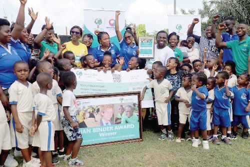 Araba Mosner-Ansong (4th from left), International Programme Manager, Sinapi Aba, joins jubilant pupils and teachers of the Royal Choice Academy after she presented a dummy cheque for GH¢20,050 to the school for emerging winners of the 2022 Jan Binder Awards