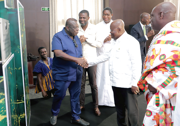 President Akufo-Addo (2nd from right) congratulating Kwame Ofosu Bamfo (left), Chief Executive of Alisa Hotel, after the inauguration of Alisa branch in Tema. With them are Okraku Mantey (2nd left), a Deputy Minister of Tourism, Arts and Culture, and Nii Adjetey Agbo II (right), Mankralo, Tema Traditional Council. Picture: SAMUEL TEI ADANO