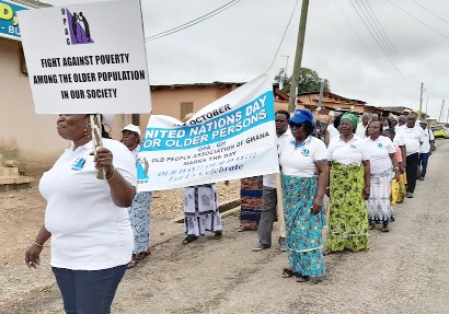 Members of the Old People Association in a health walk on the streets of Bubuashie to mark the day for old persons in Accra. Picture: GABRIEL AHIABOR