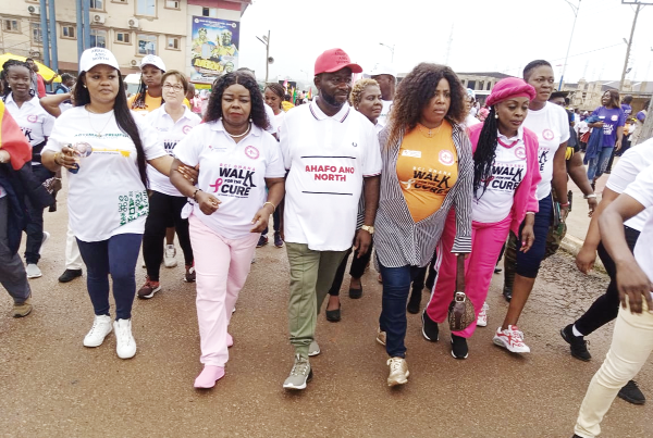 Dr Beatrice Wiafe-Addai (2nd from left), President of BreastCare International, and some dignitaries in a health walk to create awareness of breast cancer
