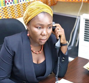 Fatimatu Abubakar, Deputy Minister of Information, assuming customer service duties during the commemoration event in Accra yesterday