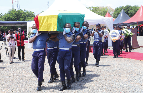 The remains of the late Nana Ampadu being carried by the military.  Picture: SAMUEL TEI ADANO