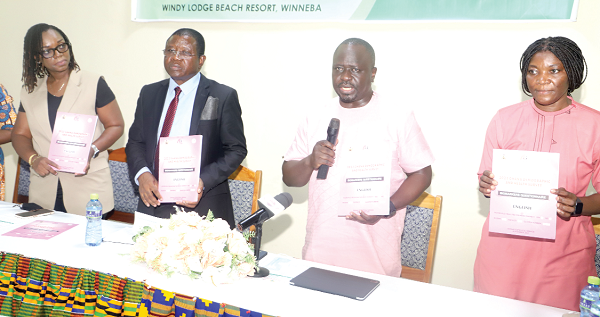  Professor Samuel Kobina Annim (2nd from right), Government Statistician, being supported by Dr Faustina Frimpong Ainguah (right), Deputy Government Statistician; Dr Kofi Issah (2nd from left), Director, Family Health Division, Ghana Health Service,  and Dr Keziah Malm, Programme Manager, National Malaria Control Programme, to launch the survey in Winneba. Picture: Gabriel Ahiabor