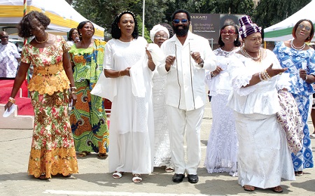 Elizabeth Naa Kwatsoe Tawiah Sackey (2nd from left), Chief Executive of the Accra Metropolitan Assembly; Dr Alfred Okoe Vanderpuije (2nd from right), a former Chief Executive of the AMA, and Sherry Ayittey (left), a former Minister of Fisheries and Aquaculture Development, dancing with Mercy Naa Afrowa Needjan (right), the President of the Greater Accra Market Women’s Association, and some market women at the ceremony. Picture: ESTHER ADJORKOR ADJEI