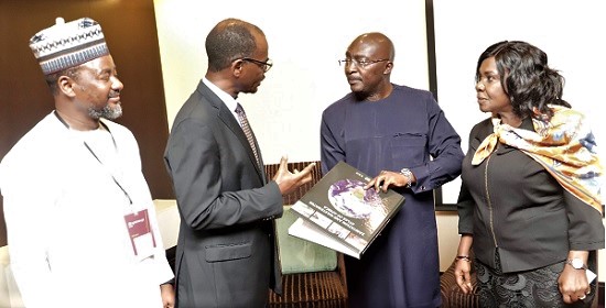 Vice-President Dr Mahamudu Bawumia receiving a book on sanitation from Osward Mulenga Chanda (2nd from left), Director, African Development Bank Group. With them are Cecilia Abena Dapaah (right), Minister of Sanitation and Water Resources, and Tanko Azika (left), Programme Director, Africa Ministerial Council on Water and Energy. Picture: SAMUEL TEI ADANO