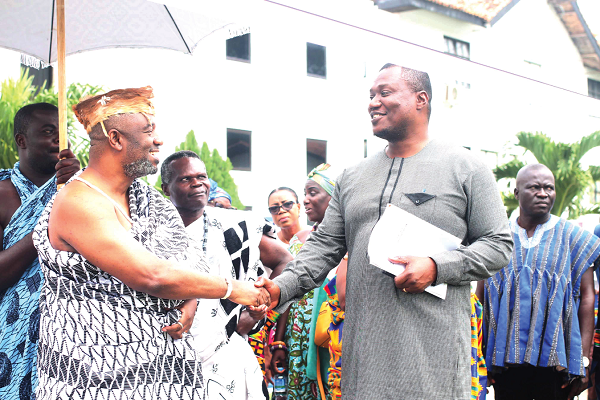 King Nii Tackie Teiko Tsuru II (left), Ga Mantse, in a handshake with Dr Nana Ayew Afriyie, Chairman, Parliamentary Select Committee on Health. Picture: Maxwell Ocloo