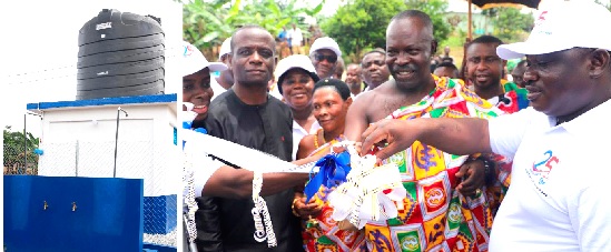 Nana Asaw Ababio (2nd from right), Kunsu-Wiosohene, being assisted by Amidu Issahaku Chinnia (right) to commission the water facility. With them are Joseph Frimpong Bonsu (2nd from left), DCE for Asafo Ano South West, and Dr Ismael Ackah (left), PURC Executive Director. Inset: One of the water facilities with its 10,000-litre reservoir