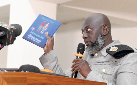 Frank P. N. Adjei-Mensah, the author, introducing the book