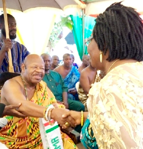 Nene Sakite II, the Konor of Manya Krobo, congratulating Joyce Nyaunu, one of the honorees