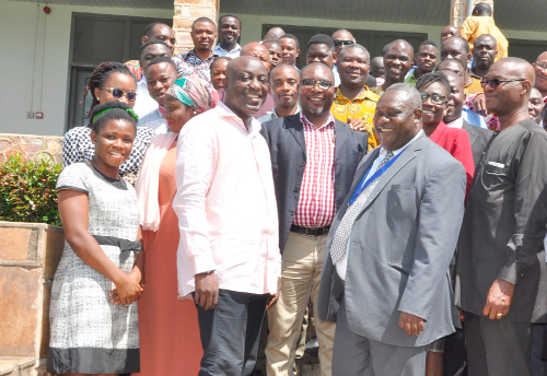Dr Offei-Mensah (middle), Deputy Director-General, IAA, and Augustus Awity (2nd from left), Volta Regional Coordinating Director, with some participants after the opening ceremony