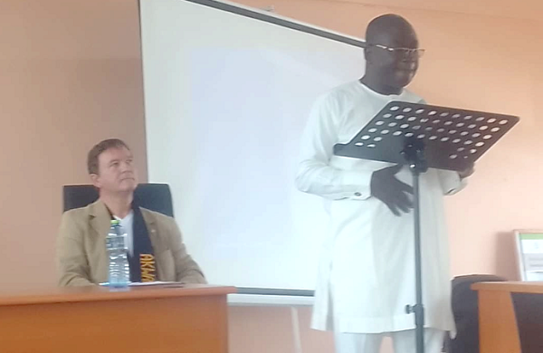 Richmond Agyenim Boateng, MCE for Kwadaso, addressing the forum. Behind him is Dirk Gene Hagelstein, the Mayor of Neu-Isenburg
