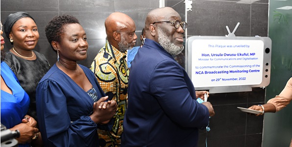 Isaac E. Osei-Bonsu (right), Board Chairman of the NCA, cutting a ribbon to officially inaugurate the BMC centre. With him are Joe Anokye (2nd from right), Director-General of the NCA, and some officials of NCA. Picture: EBOW HANSON