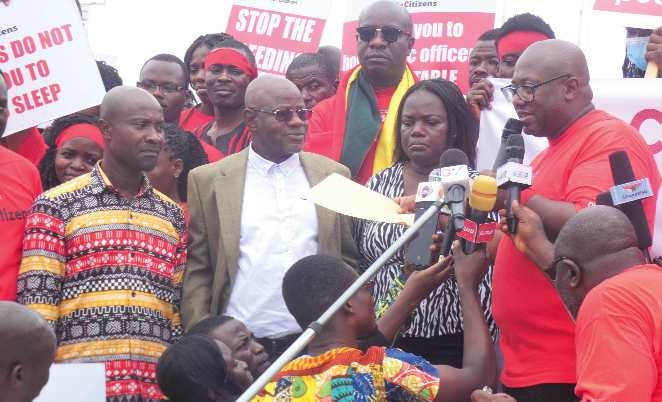  Dr Kojo Asante (right), Director of Advocacy and Policy Engagement, CDD-GHANA, addressing the press at the Independence Square in Accra. Picture: ELVIS NII NOI DOWUONA