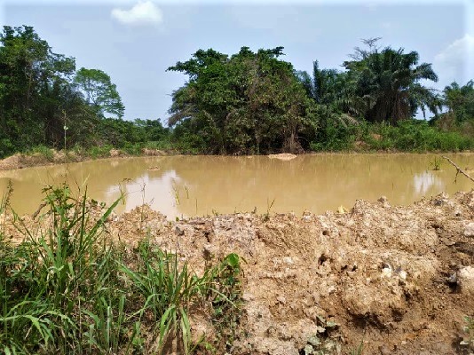 One of the deep gullies left behind by illegal miners at Manso Adubia in the Amansie South District in the Ashanti Region