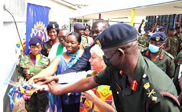 Jennifer Jones (2nd from right), President, Rotary International, being assisted by Brig. Gen. Azumah Bugri, Commander of the 37 Millitary Hospital, and Victor Asante (3rd from right), Governor, Rotary International District 9102, to cut the tape to inaugurate the renovated children’s ward. Picture: ELVIS NII NOI DOWUONA