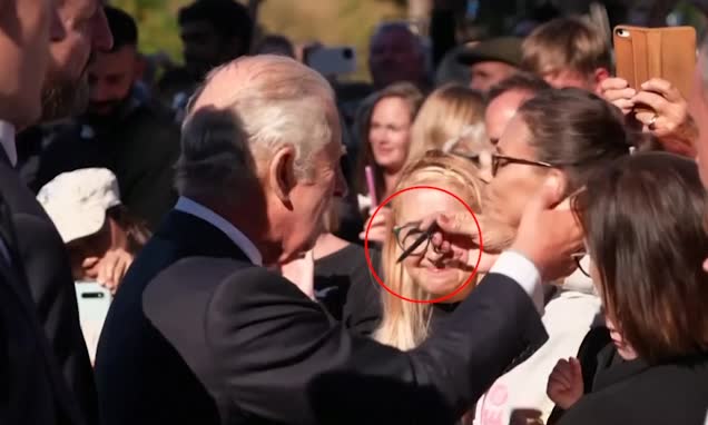 Hilarious moment well-wisher gives King Charles a pen 'just in case' after first days of his reign are beset by ink disasters
