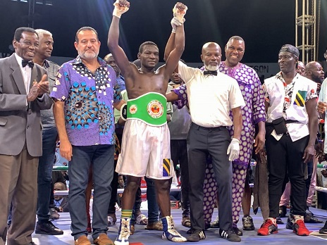 Loren Japhet (middle) being crowned as the winner by Roger Barnor supported by Fadi Fattal(left) and other members of his team