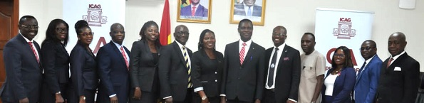 Dr Yaw Osei Adutwum (middle) with the new ICAG Council after the swearing in ceremony