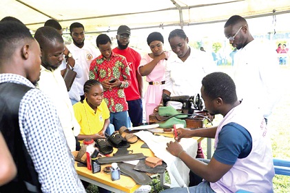 Some of the beneficiaries being taken through how to make shoes, sandals and birkenstock, during the two-day skills training workshop held in KumasiSome of the beneficiaries being taken through how to make shoes, sandals and birkenstock, during the two-day skills training workshop held in Kumasi